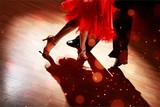 Man and a woman dancing Salsa on background