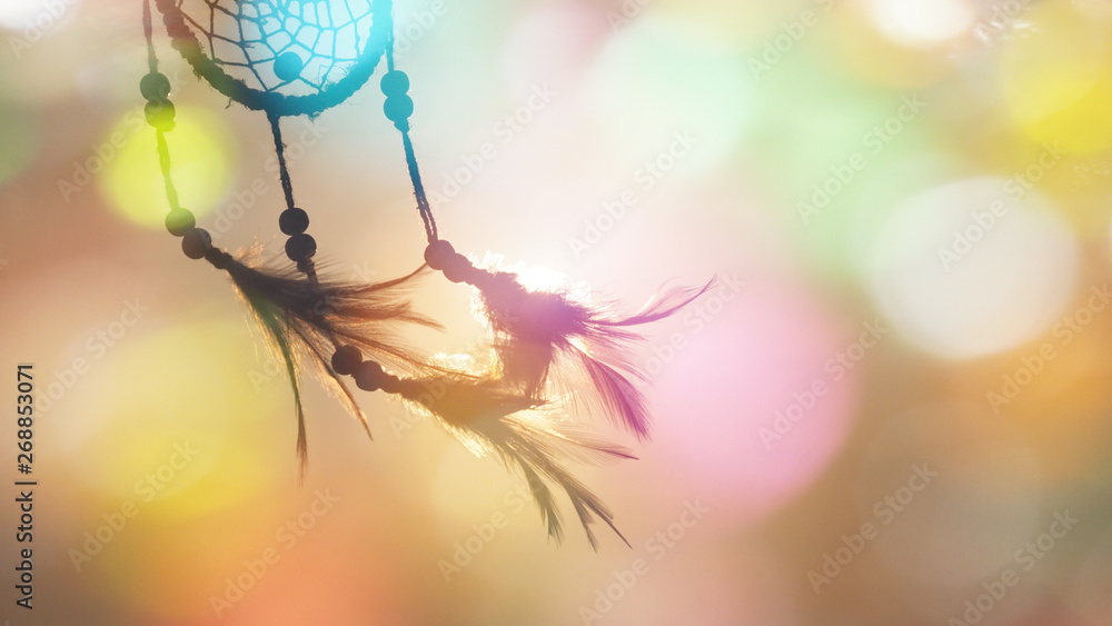 Blurred image, Dream catcher native american in the wind and blurred bright light backgrounds, abstract hope and dream concepts - obrazy, fototapety, plakaty 