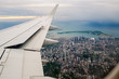 © Angela Lumsden/Stocksy - Toronto and the wing of an aircraft, at dusk
