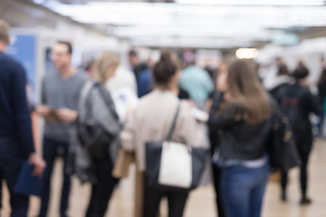 blured image of businesspeople socializing and networking during coffee break at conference meeting.