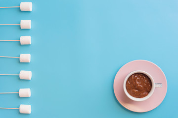 Marshmallows with chocolate in a beautiful background