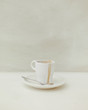 © Duet Postscriptum/Stocksy - Minimalist dirty coffee cup