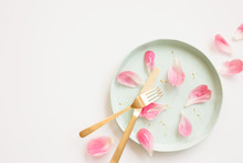 The Remains Of A Pink Peony On A Dinner Plate With Copy Space