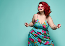 Lucky Plus-size Lady Overweight Woman In Fashion Sunglasses And Colorful Sundress Happy Dancing, Celebrating