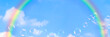  aufsteigende seifenblasen vor regenbogen am blauem himmel, sonniger hintergrund für sommer events,  konzept banner mit textraum