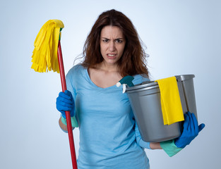 Attractive red haired woman bored and restless of cleaning and housekeeping