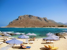 Picturesque Stavros Beach At Crete, Greece. Mountain Rising Over The Bay. Movie “Zorba The Greek” With Anthony Quinn Was Filmed In This Place. 