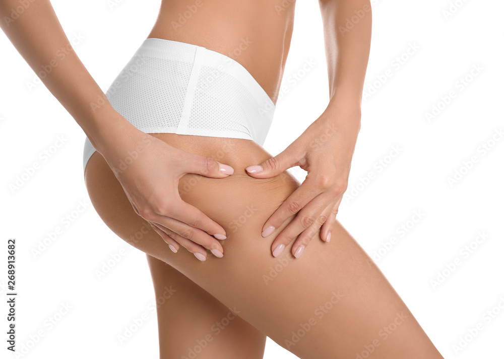 Closeup view of slim woman in underwear on white background. Cellulite problem concept - obrazy, fototapety, plakaty 