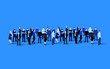 © hobbitfoot - Big people crowd on blue background. Vector