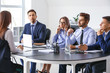 © Pixel-Shot - Human resources commission interviewing woman in office