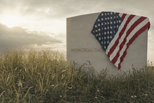 American Flag Laying On Grave At The Peaceful Flower Meadow To Remember The Memorial Day. 3D Rendering