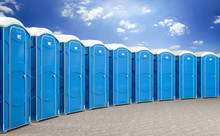 3d Illustration Of A Group Of Mobile Blue Bio Toilets.