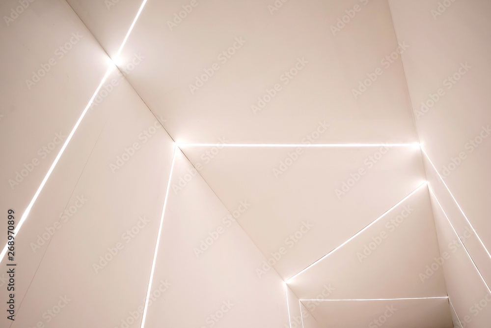 Empty concrete room wall and glowing LED. - obrazy, fototapety, plakaty 