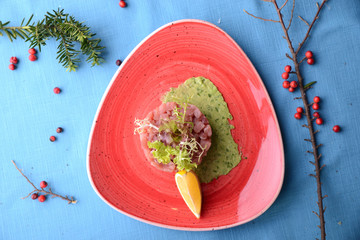 Wall Mural - tuna tartar with lemon and sauce