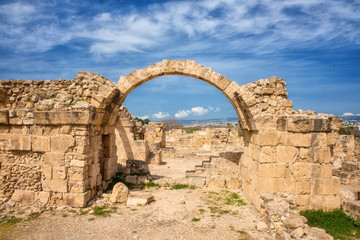 Saranta Kolones or Forty columns castle, ruined medieval fortress in Paphos Archaeological Park (Kato Pafos), harbour of Paphos, Cyprus. Scenic landscape with ruin of ancient architecture and blue sky