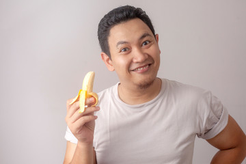 Canvas Print - Asian Man Smiling with Banana