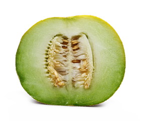 Fresh cantaloupe melon sliced in half isolated on white background