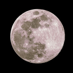 a full moon isolated against a black night sky in high resolution with fine details on the surface w