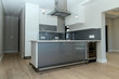 A grey small kitchen
