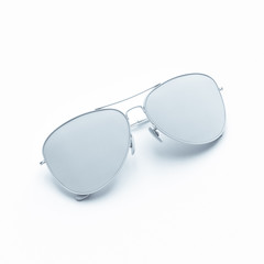 Sticker - Realistic gray sunglasses lie on gray background. Summer poster. 3D model render illustration