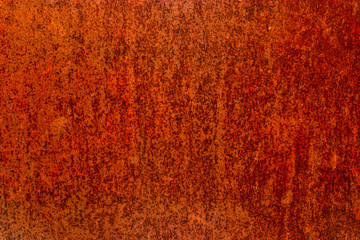 Worn iron sheet covered with red rust