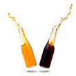 Cola and orange soda splashing out of glass bottle isolated on white background.