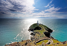 View From Anglesey Out To Sea With South Stack Lighthouse