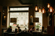 © Dzmitry - Cozy cafe atmosphere. Focus on bulbs