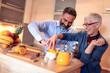 © ivanko80 - Mature couple making fresh juice