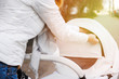 © gesrey - Woman strolling with baby-carriage. Female hands close modular pop-up baby-carriage.