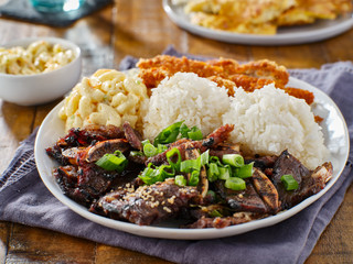 hawaiian bbq plate with mix of chicken katsu, korean kalbi beef short ribs, rice, and macaroni salad