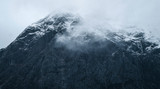 Fototapeta Góry - Snowcapped mountain peak