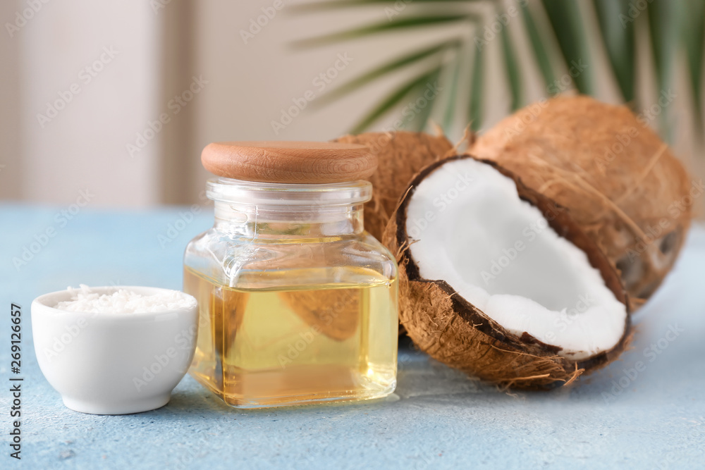 Composition with coconut oil on table