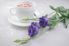 Mixture Herbal Floral Tea With Petals, Dry Berries And Fruits. Healthy Drink. Hot Fruit, Healthy Tea In A White Mug