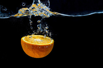 Orange with fresh water splash