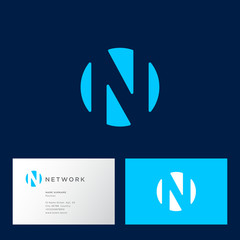 N letterin a circle. N logo, blue monogram, isolated on a dark background. Identity. Business card.