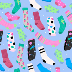 Wall Mural - Various bright socks with different prints. High and low socks. Hand drawn vector seamless pattern. Colored trendy fashion illustration. Flat design. Blue background