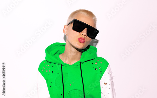 Tomboy Fashion Girl With A Short Blonde Haircut And Stylish Look