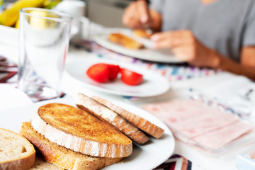 Wall Mural - young man preparing breakfast.