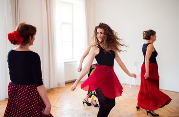 Poster - Group of senior people in dancing class with dance teacher.