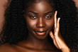 © Beauty Agent Studio - Beauty spa treatment concept.  African Skincare model portrait  with perfect dark skin and curly hair.