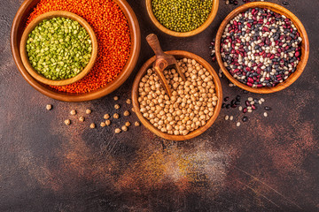Wall Mural - Assortment  of Legumes - lentils, peas, mung, chickpeas and different beans.
