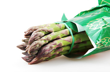 Wall Mural - Close-Up Of Asparaguses Against White Background