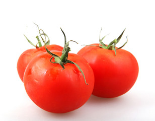 Wall Mural - Close-Up Of Red Tomato On White Background