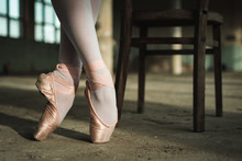 Close-up Photo Of Ballerinas Pointe Shoes. Ballet Concept