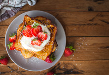 French Toast With Fresh Strawberries, Coconut Shreds And Honey, On Wooden Background, Top View, Text Space, Copy Space