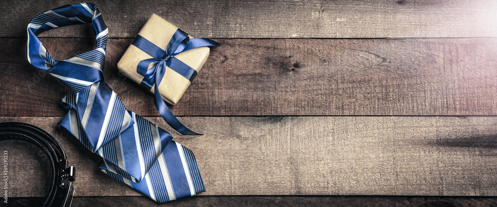 Tie Belt And Gift Box  On Wooden Table With Sunlight - Fathers Day Concept - obrazy, fototapety, plakaty 