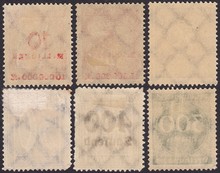 The Reverse Side Of Old Postage Stamps With The Remnants Of Glue.Translucent Numbers And Letters