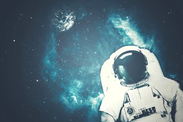 Wall Mural - astronaut at spacewalk. cosmic art, science fiction wallpaper. beauty of deep space. billions of gal
