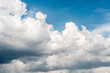 fluffy white cloud on air clear blue sky weather background. high contrast